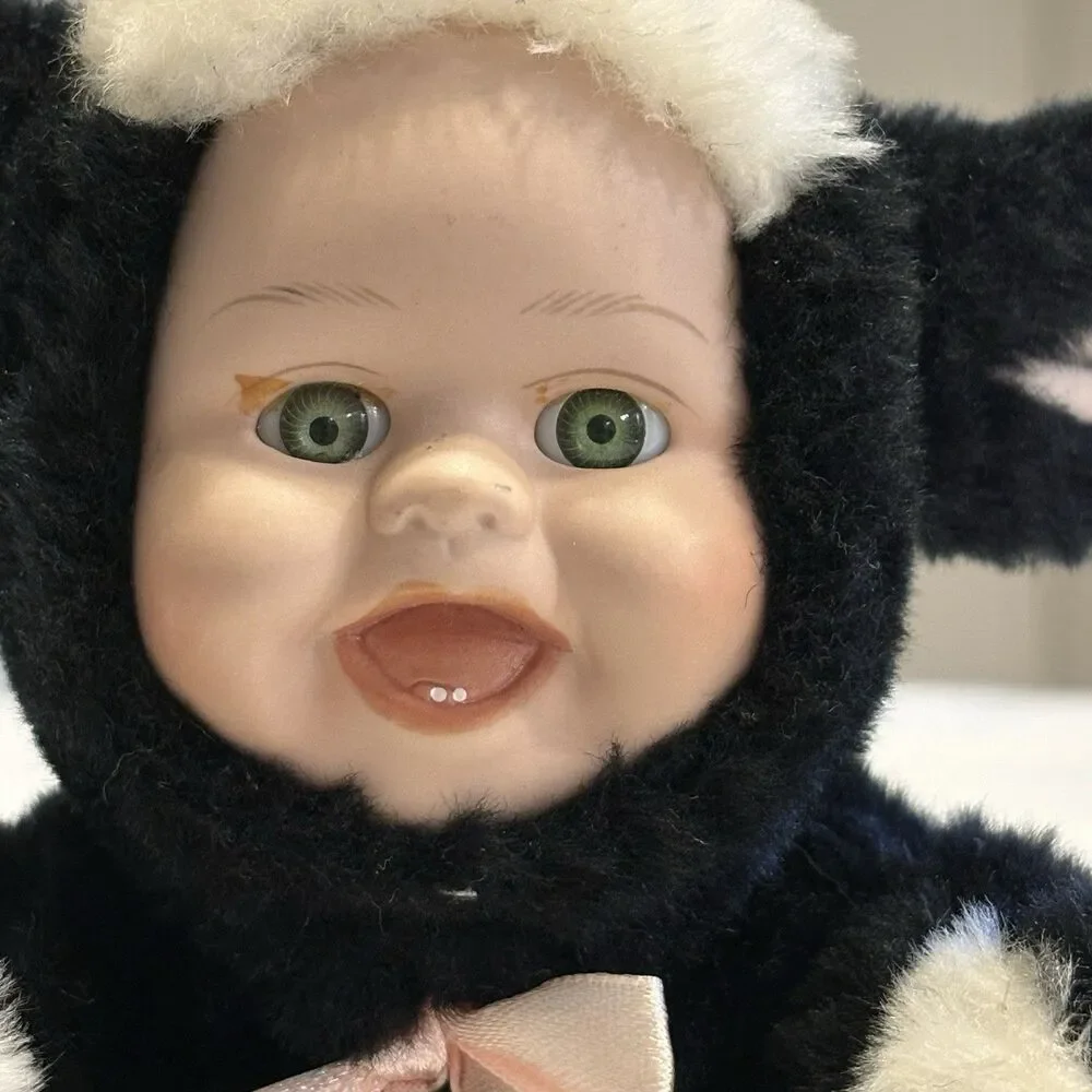 Vintage Rubber Face Baby With Cow Plush Suit